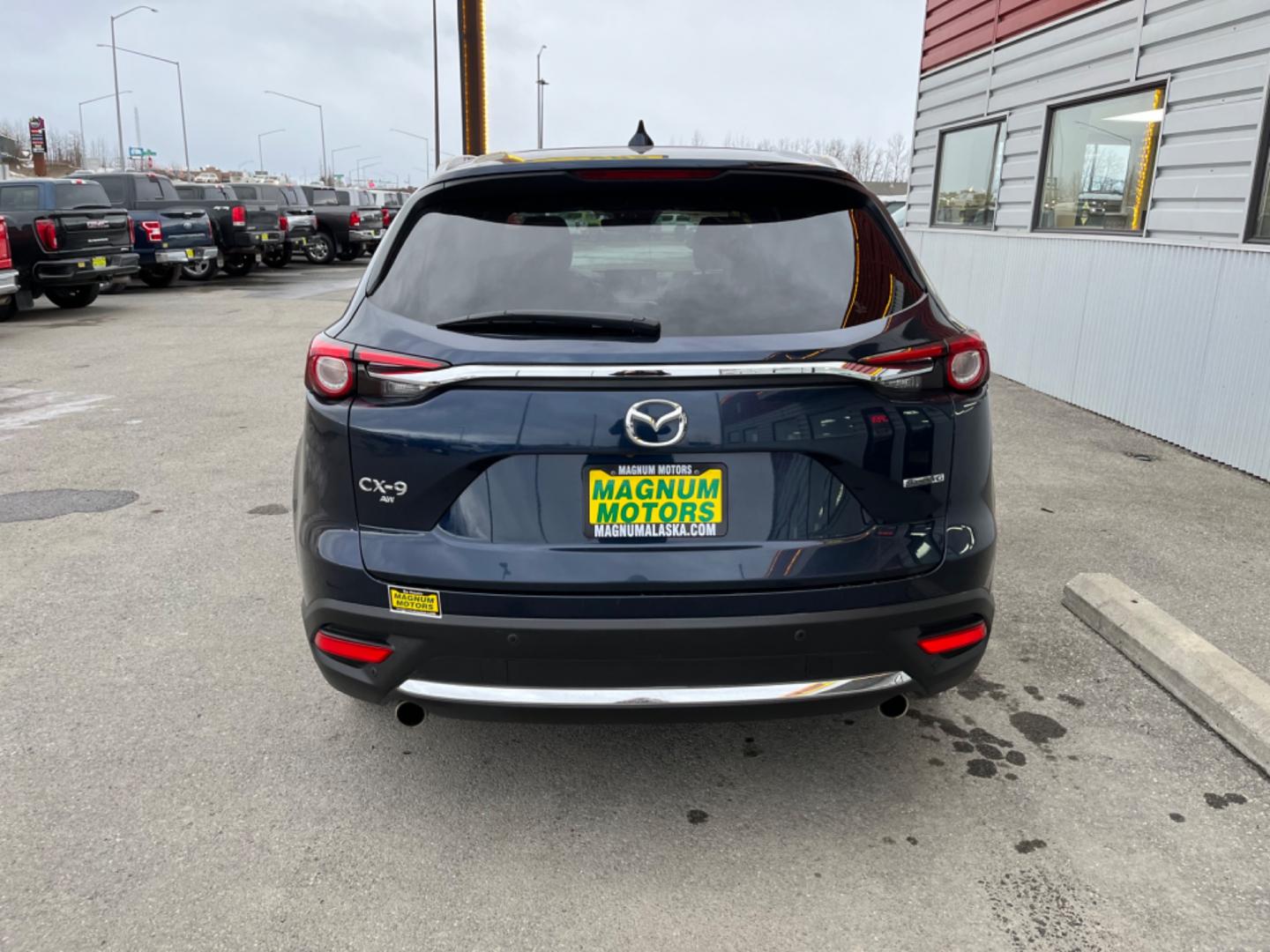 2021 Blue Mazda CX-9 Grand Touring AWD (JM3TCBDY8M0) with an 2.5L L4 DOHC 16V engine, 6A transmission, located at 1960 Industrial Drive, Wasilla, 99654, (907) 274-2277, 61.573475, -149.400146 - Photo#4